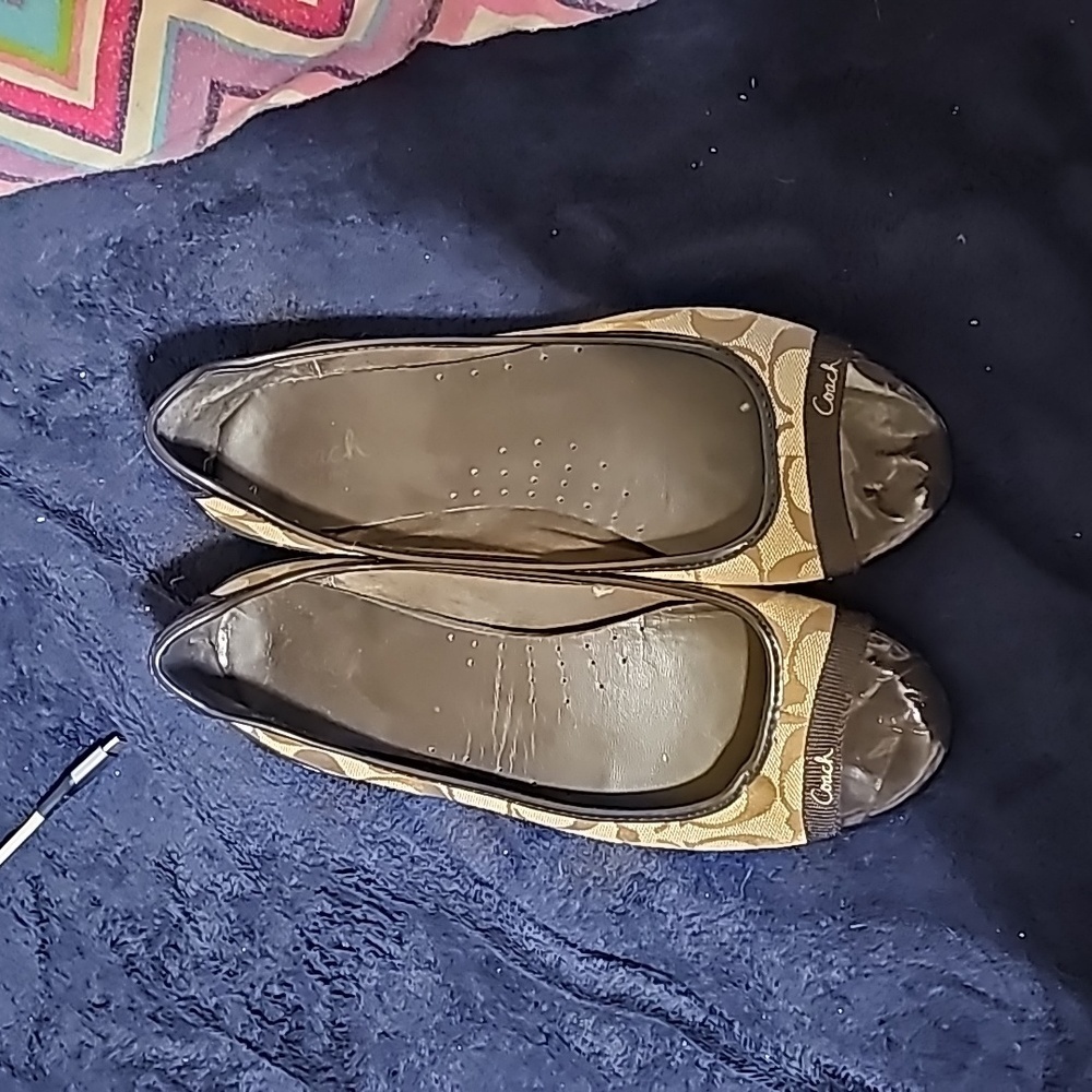 Brown size 10 coach flats.